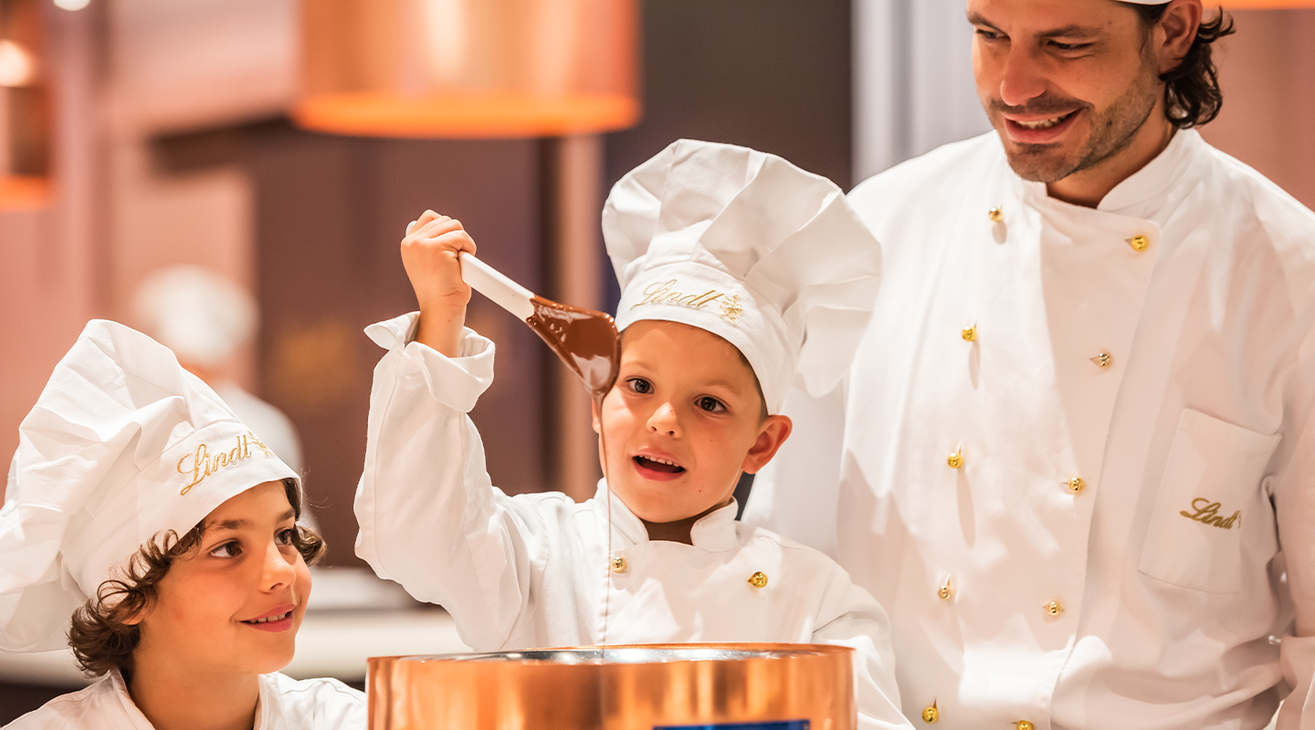 Child enthusiastically brews chocolate